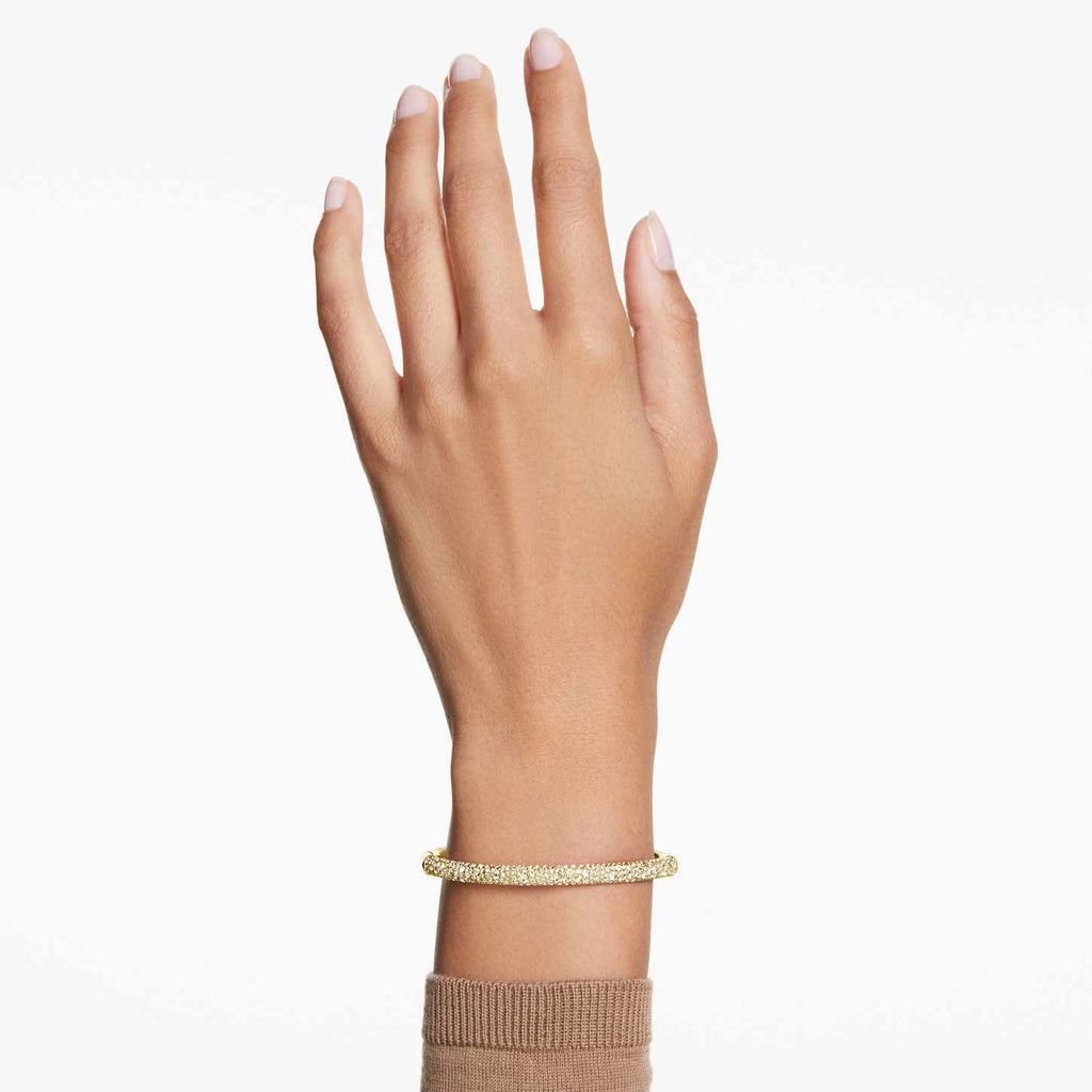 Swarovski Bracciale rigido Sublima, Pavé a neve, Tono dorato, Finitura oro 18K